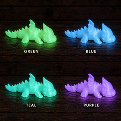 3D printed Little Critters toy on rustic wood background